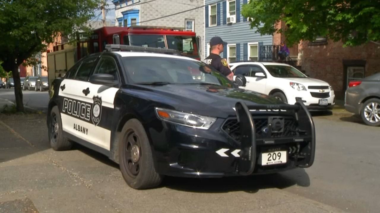 Police cruiser and cop.