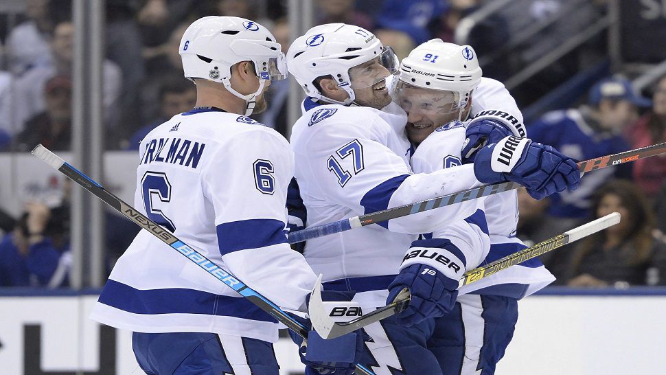 Tampa Bay Lightning left wing Alex Killorn (17) celebrates with the bench after scoring against the Buffalo Sabres during the first period of an NHL hockey game Thursday, Nov. 29, 2018, in Tampa, Fla. (AP Photo/Chris O'Meara)