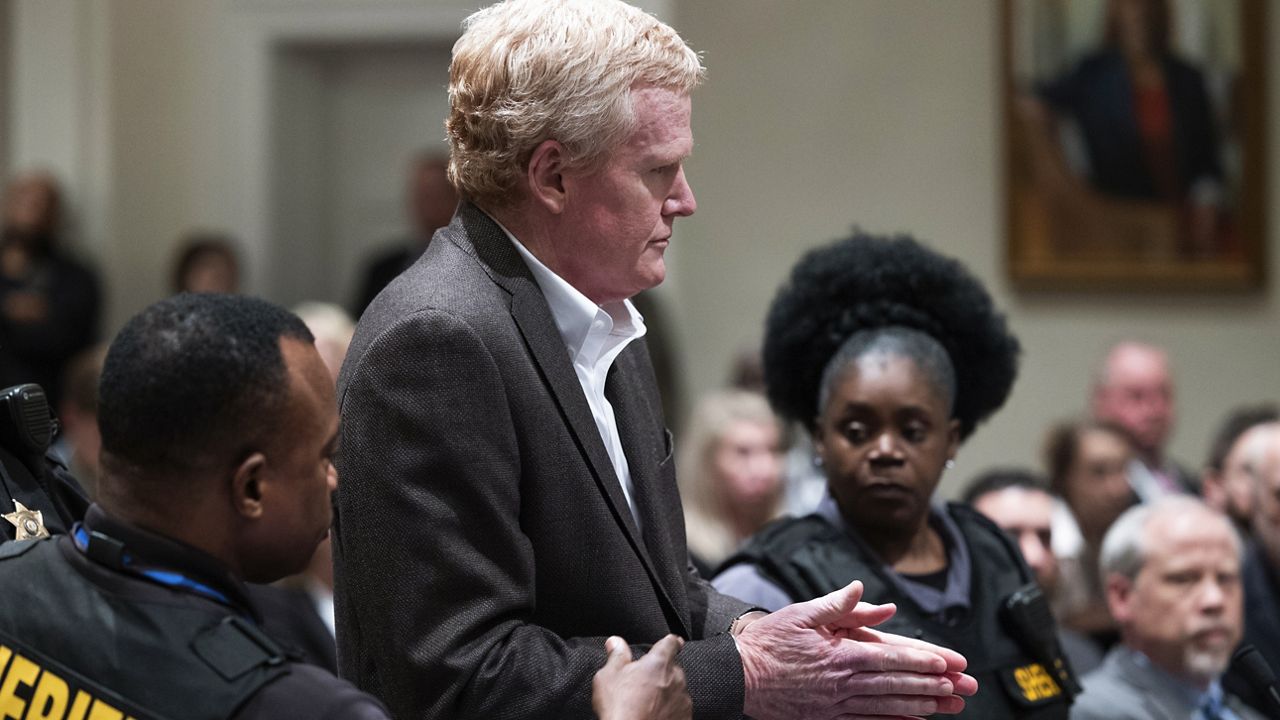 Alex Murdaugh, center, is handcuffed in the courtroom Thursday after a guilty verdict in his murder trial was read at Colleton County Courthouse in Walterboro, S.C. (Joshua Boucher/The State via AP, Pool) 