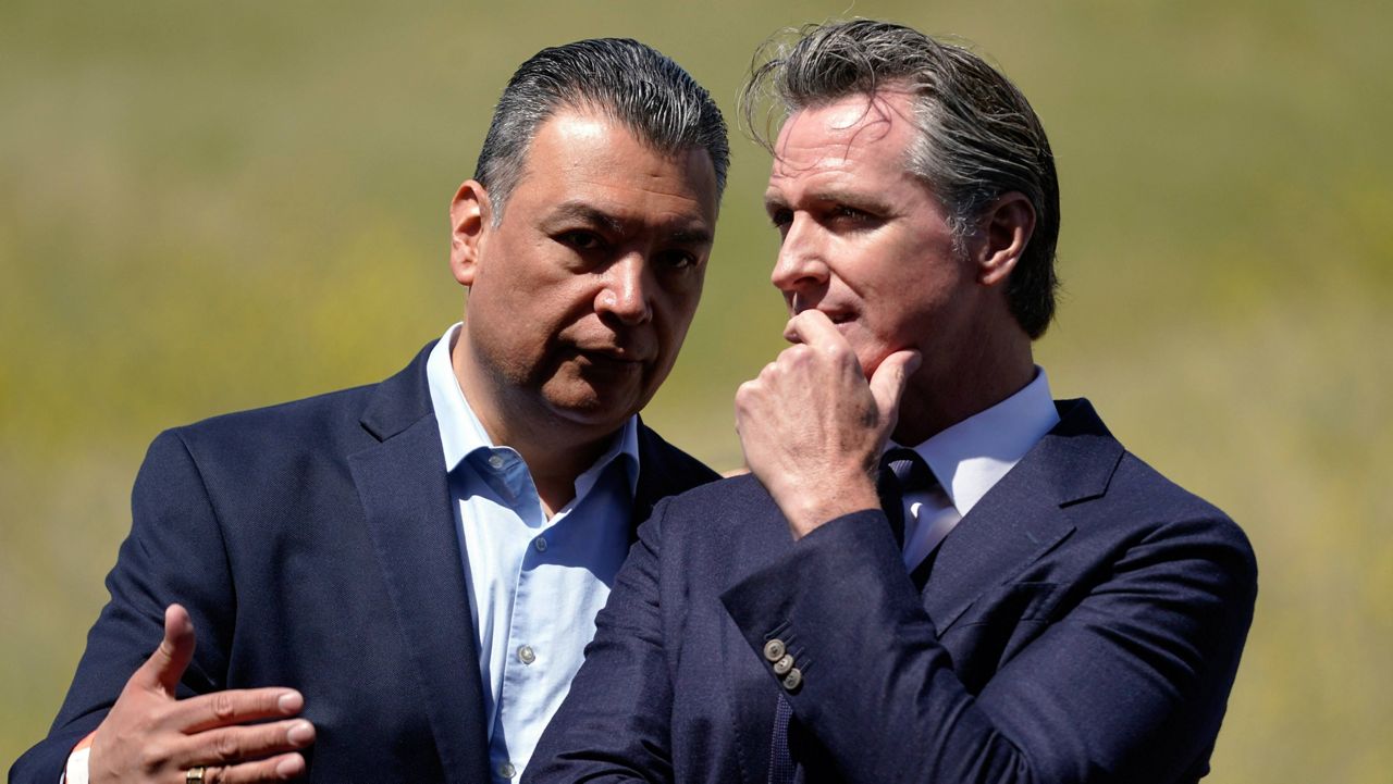 California Gov. Gavin Newsom, right, talks to Sen. Alex Padilla, D-Calif., during a ground breaking ceremony for the Wallis Annenberg Wildlife Crossing, Friday, April 22, 2022, in Agoura Hills, Calif. Padilla, who was appointed by Newsom, will face Republican constitutional lawyer Mark Meuser to fill the last two months of Kamala Harris' U.S. Senate term and the other for a new six-year term. (AP Photo/Marcio Jose Sanchez)