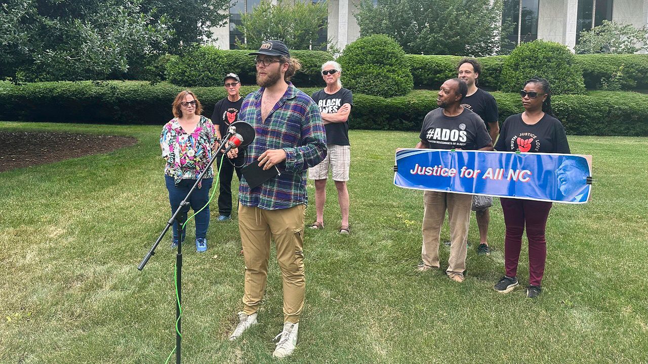 Drew Lischke, co-chair of the Justice for All Party of North Carolina, speaks at a news conference outside the Legislative Building in Raleigh, N.C., Monday, June 3, 2024, to discuss petition signature efforts by the group to qualify as an official political party in the state. News conference speakers supported making West the party's candidate for president on state ballots this fall. (AP Photo/Gary D. Robertson)