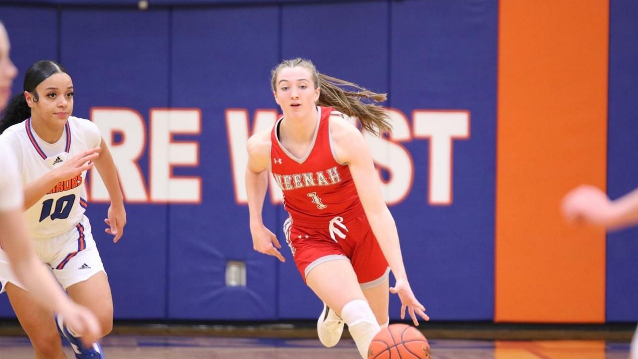 Allie Ziebell (1) brings the ball up court against Appleton West. 