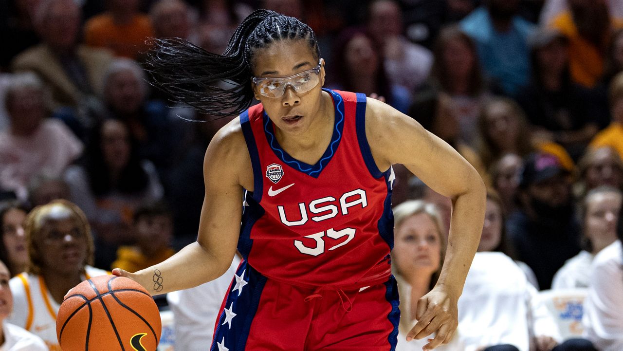 Team USA guard Allisha Grey (35) drives to the basket during the first half of an NCAA college basketball exhibition game against Tennessee, Sunday, Nov. 5, 2023, in Knoxville, Tenn. (AP Photo/Wade Payne)