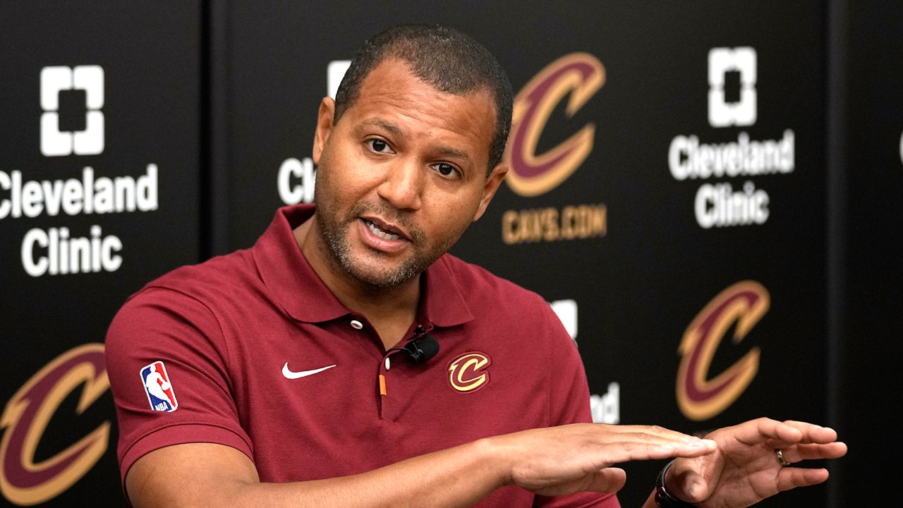 Koby Altman, president of basketball operations for the Cleveland Cavaliers, answers a question at a news conference in Brecksville, Ohio, Friday, May 24, 2024. (AP Photo/Sue Ogrocki)