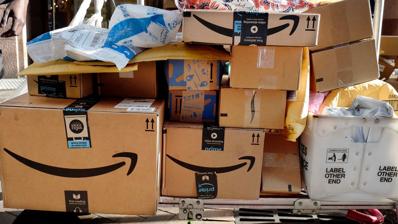 Amazon packages (Mark Lennihan/AP)