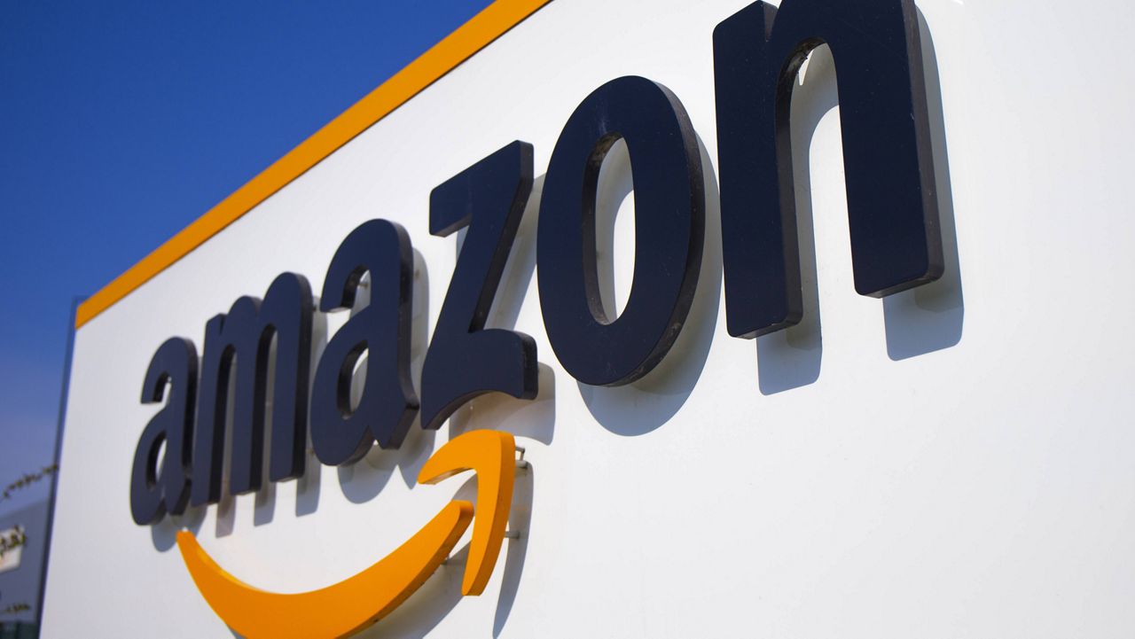 The Amazon logo appears in Douai, northern France on April 16, 2020. (AP Photo/Michel Spingler, File)