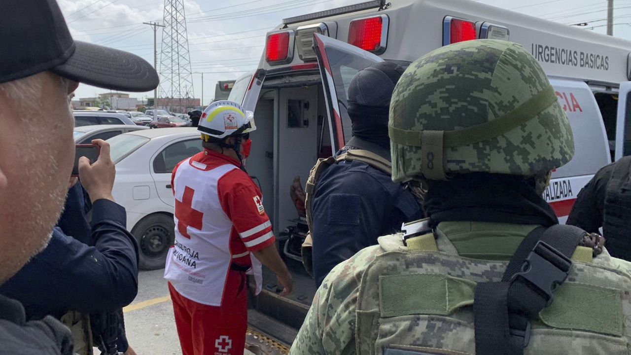 A Red Cross worker closes the door of an ambulance carrying two Americans found alive after their abduction in Mexico last week, in Matamoros, Tuesday, March 7, 2023. Two of four Americans whose abduction in Mexico was captured in a video that showed them caught in a cartel shootout have been found dead, officials said Tuesday. The two surviving Americans were taken to the border near Brownsville, Texas, in a convoy of Mexican ambulances and SUVs. (AP Photo)