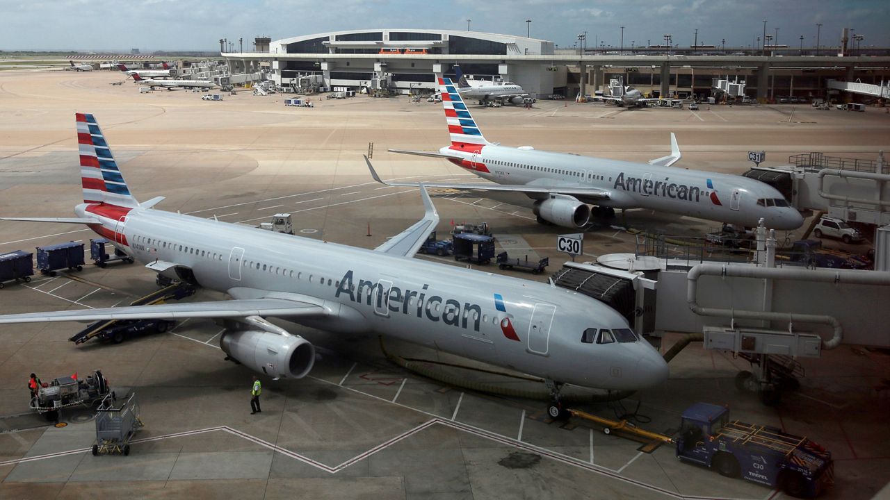 In this June 16, 2018, photo, American Airlines aircrafts are seen at Dallas-Fort Worth International Airport in Grapevine, Texas. (AP Photo/Kiichiro Sato)