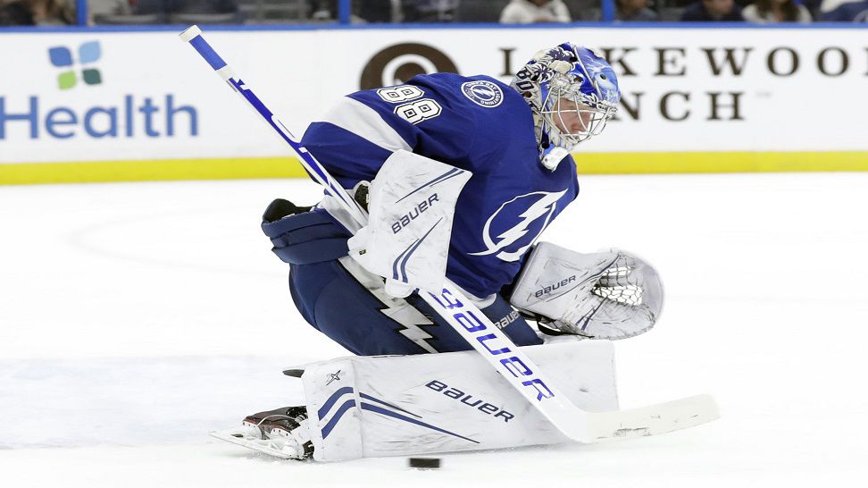 Tampa Bay Lightning goaltender Andrei Vasilevskiy makes a pad save on a shot by the Carolina Hurricanes during the first period of an NHL hockey game Thursday, Jan. 10, 2019, in Tampa, Fla. (AP Photo/Chris O'Meara)