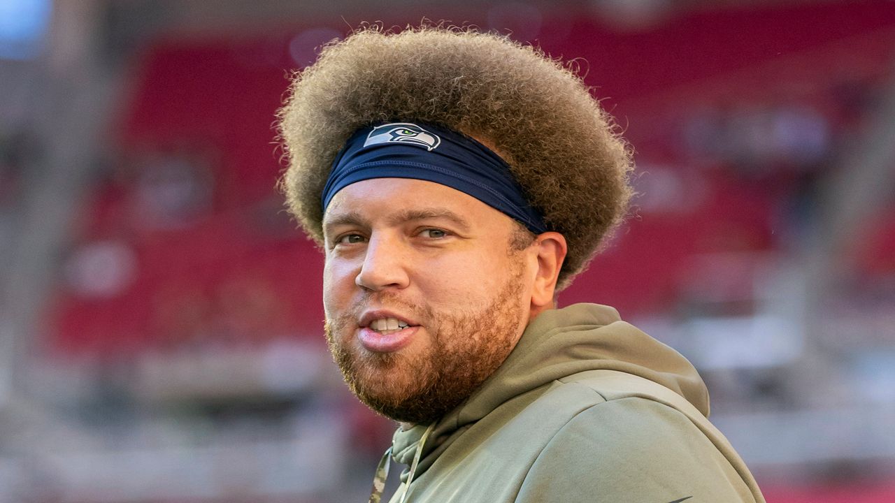 Seattle Seahawks offensive line coach Andy Dickerson warms up his players before the Seahawks play against the Arizona Cardinals in an NFL football game, Sunday, Nov. 6, 2022, in Glendale, Ariz. (AP Photo/Jeff Lewis, File)