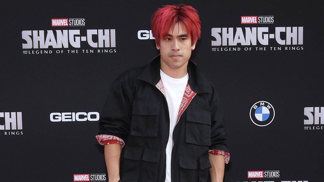 Andy Le, who plays the "Death Dealer" character in Marvel's upcoming film, poses on the red carpet at the "Shang-Chi and the Legend of the Ten Rings" premiere at El Capitan Theatre in Los Angeles on Aug. 16, 2021. (SIPAUSA/Sthanlee B. Mirador)