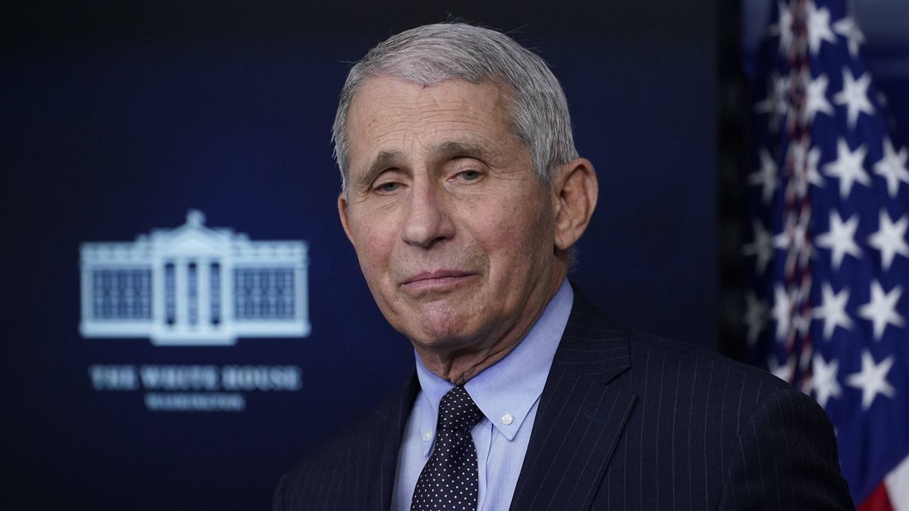 Dr. Anthony Fauci listens as he speaks with reporters in the James Brady Press Briefing Room at the White House on Thursday. (AP Photo/Alex Brandon)