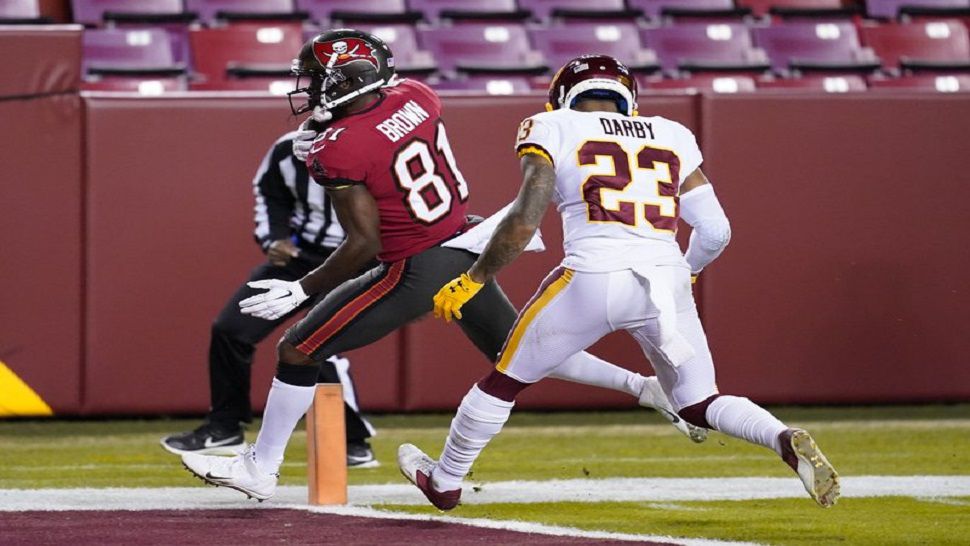 Nov 14, 2021; Landover, MD USA; Tampa Bay Buccaneers quarterback Tom Brady  (12) throws a pass during an NFL game at FedEx Field. The Washington Football  Team beat the Buccaneers 29-19. (Steve