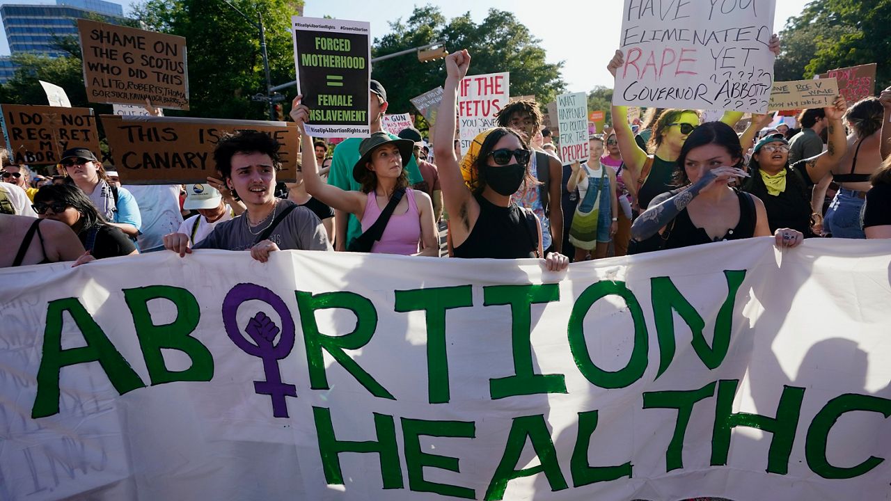 Demonstrators march and gather near the Texas state Capitol in Austin following the Supreme Court's decision to overturn Roe v. Wade on June 24, 2022.  (AP Photo/Eric Gay, File)