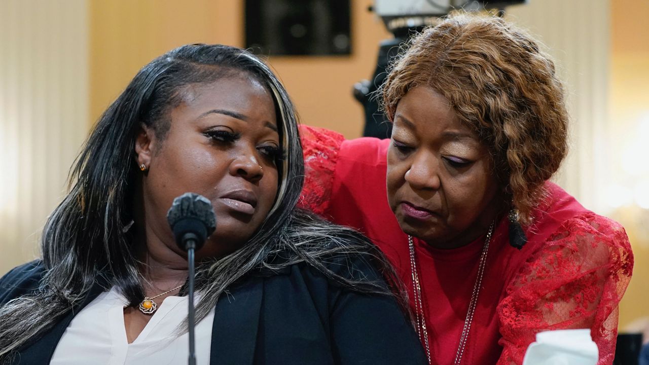 Wandrea "Shaye" Moss, a former Georgia election worker, and her mother Ruby Freeman, right, will be among the 12 individuals honored by President Joe Biden on Friday, Jan. 6, 2023, with the nation's second highest civilian honor for defending the Capitol during the insurrection on Jan. 6, 2021, and safeguarding the will of American voters in the 2020 presidential election. (AP Photo/Jacquelyn Martin, File)