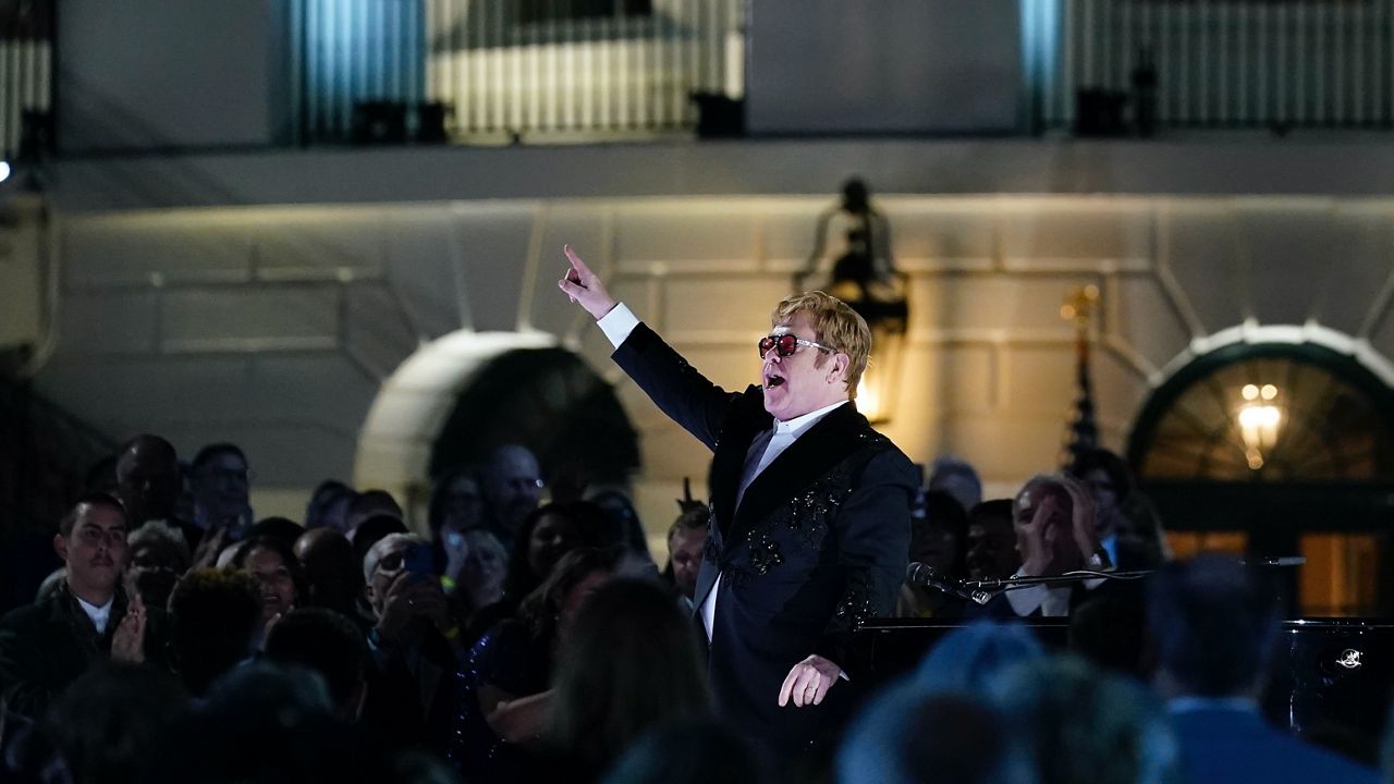 Elton John performs on the South Lawn of the White House in Washington, Friday, Sept. 23, 2022. The show was called "A Night When Hope and History Rhyme," a reference to a poem by Irishman Seamus Heaney that President Joe Biden often quotes. (AP Photo/Susan Walsh)