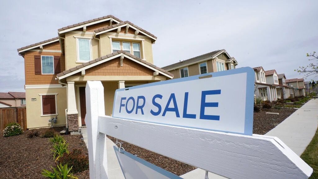 A for sale sign is posted in front of a home in Sacramento, Calif., Thursday, March 3, 2022. (AP Photo/Rich Pedroncelli, File)