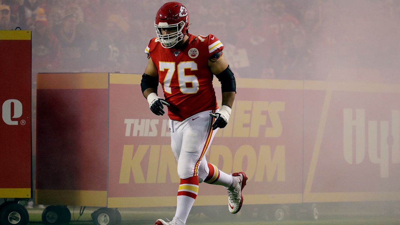 Kansas City Chiefs offensive guard Laurent Duvernay-Tardif runs onto the field before an NFL football game against the Green Bay Packers Sunday, Oct. 27, 2019, in Kansas City, Mo. (AP Photo/Charlie Riedel)