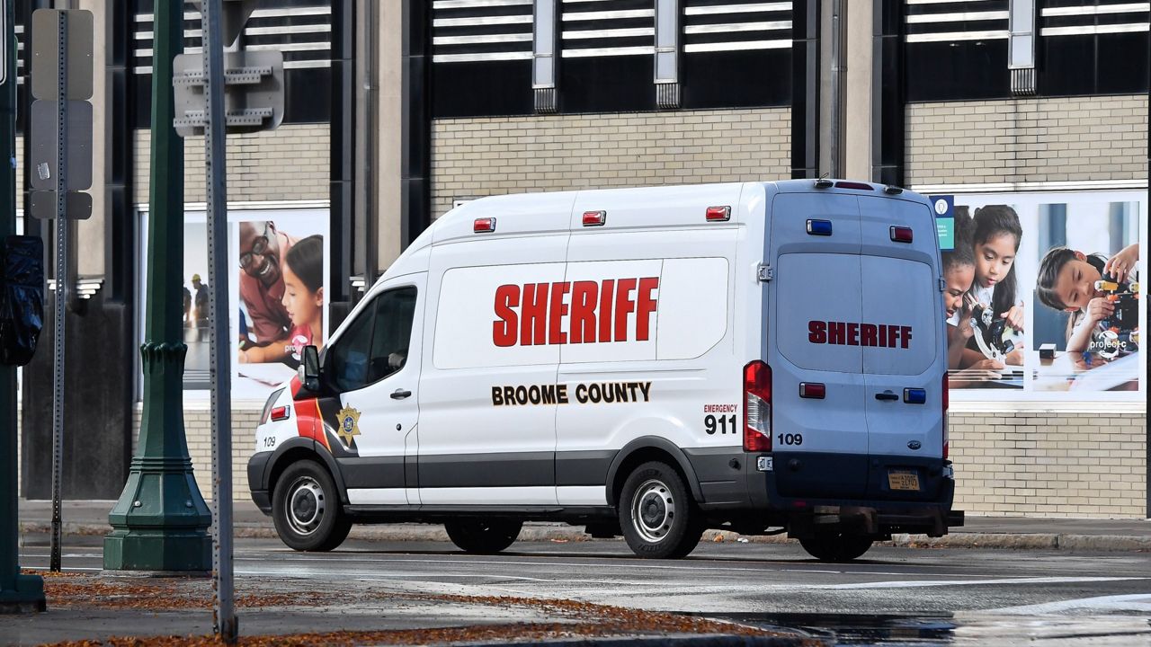 A Broome County Sheriff's van leaves U.S. District Court in Syracuse, N.Y., Wednesday, Nov. 1, 2023. Patrick Dai, a 21-year-old Cornell University student accused of posting threats online to shoot and stab Jewish people on the campus, waived his right to a bail hearing during his first appearance in federal court Wednesday. The judge ordered him to remain in Broome County jail, where he has been since he was arrested. (AP Photo/Adrian Kraus)