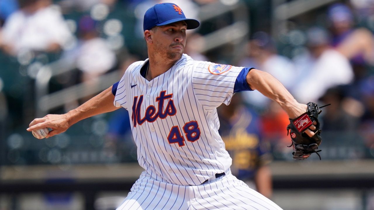 New York Mets' Jacob deGrom delivers a pitch during the first inning of the first baseball game of a doubleheader against the Milwaukee Brewers Wednesday, July 7, 2021, in New York. (AP Photo/Frank Franklin II)