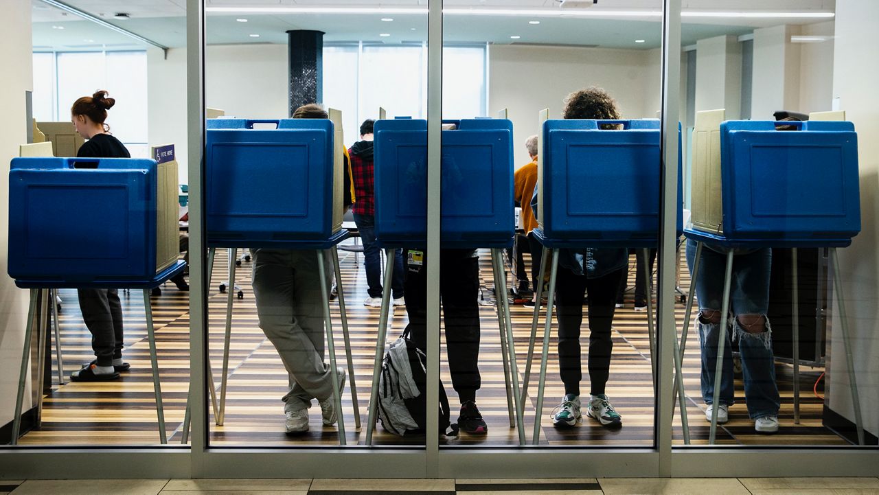 Voters fill out their ballots in booths on Election Day, Tuesday, Nov. 8, 2022, at Petersen Residence Hall on the University of Iowa campus in Iowa City, Iowa. (Joseph Cress/Iowa City Press-Citizen via AP)