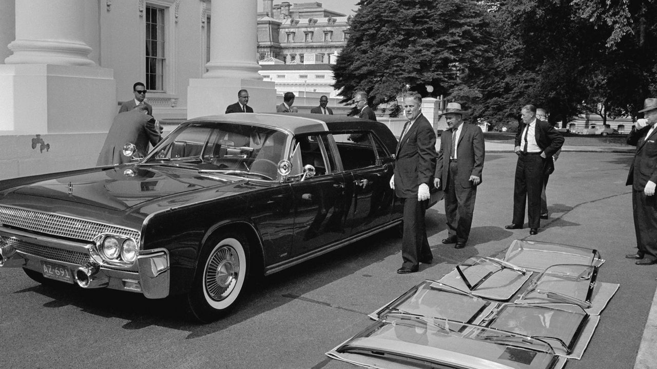 This file photo from June 14, 1961 shows the plastic-topped limousine for Pres. John F. Kennedy's as it sits outside the White House, after its delivery in Washington