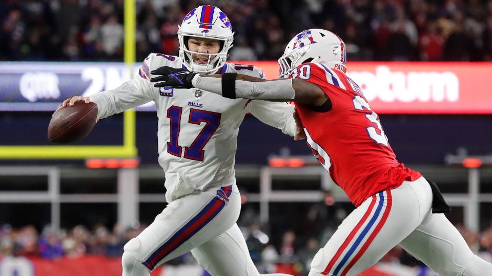 Josh Allen wearing a Bills Ryan Fitzpatrick jersey during pregame