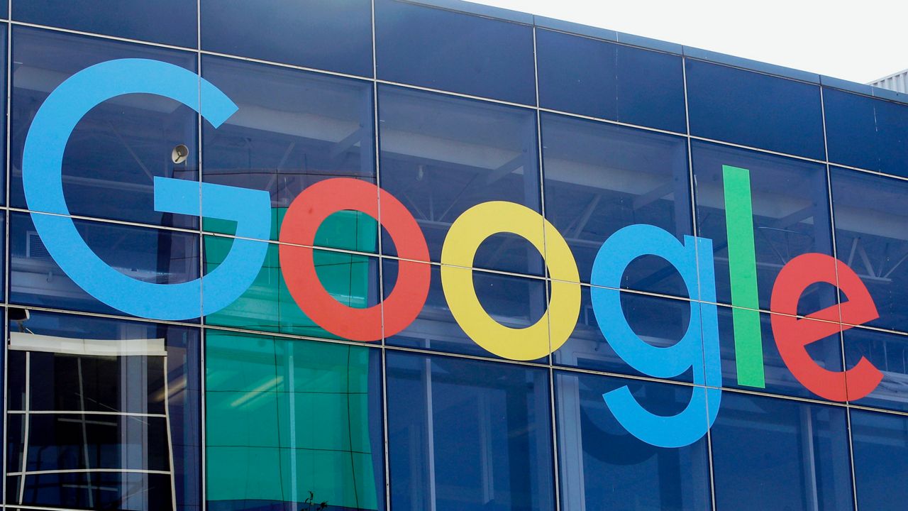 A sign is shown on a Google building at their campus in Mountain View, Calif., on Sept. 24, 2019. (AP Photo/Jeff Chiu, File)