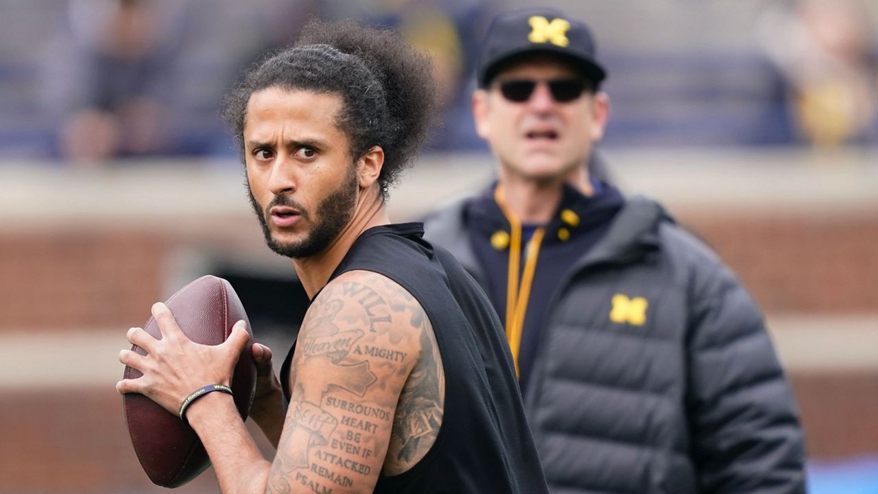 Michigan's Jim Harbaugh compares QBs to Kaepernick, Smith