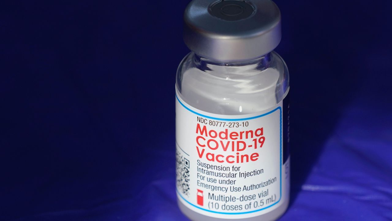 In this March 4, 2021 file photo, a vial of the Moderna COVID-19 vaccine rests on a table at a drive-up mass vaccination site. (AP Photo/Ted S. Warren, File)