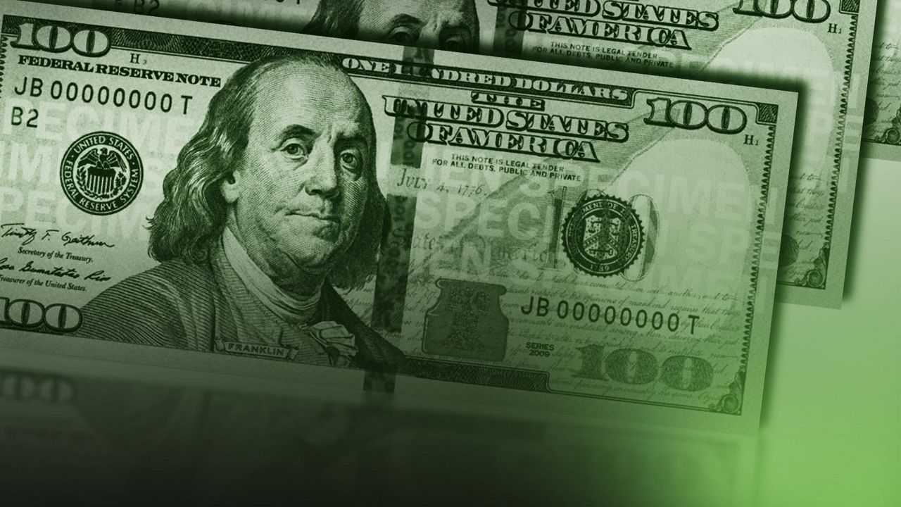 green graphic showing multiple 100-dollar bills