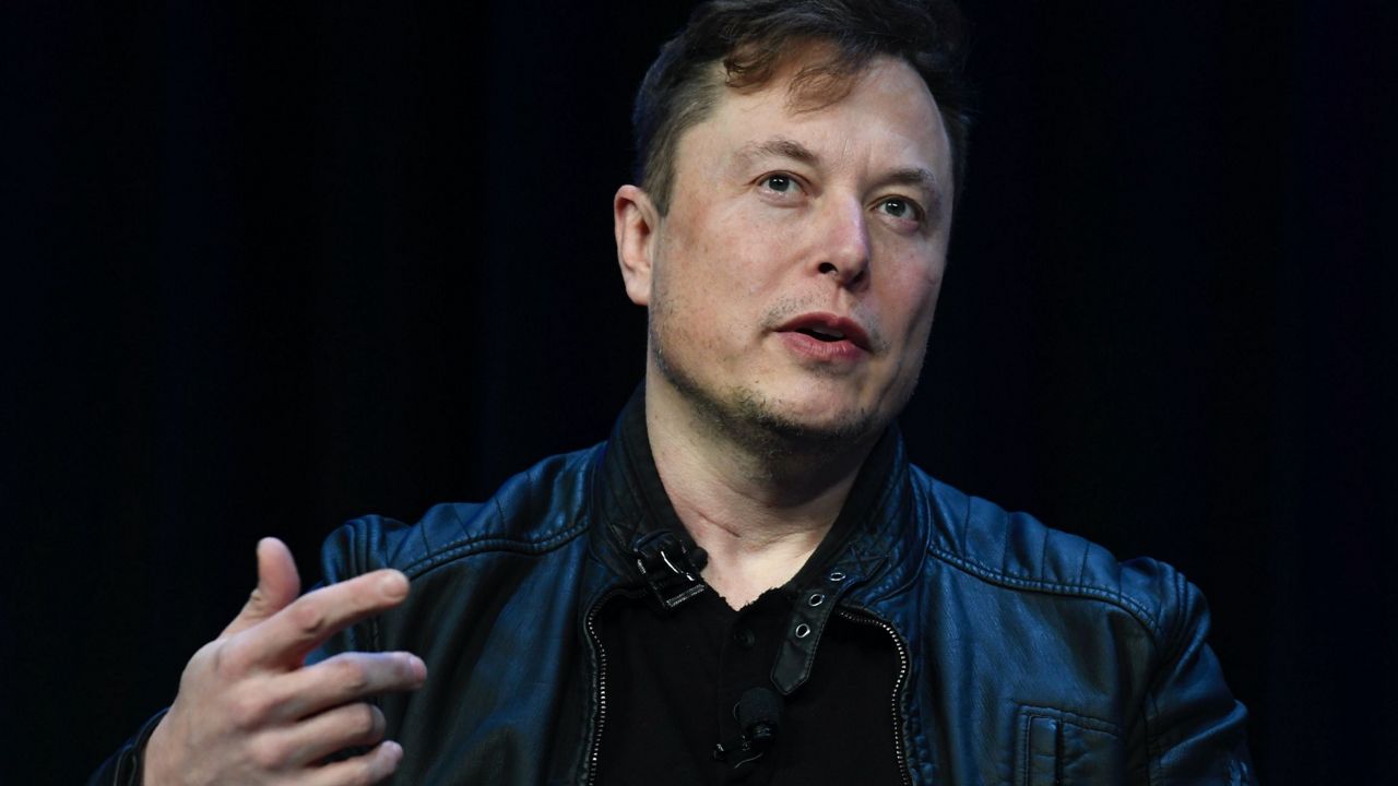 Tesla and SpaceX Chief Executive Officer Elon Musk speaks at the SATELLITE Conference and Exhibition on March 9, 2020, in Washington. Lawyers for Tesla shareholders suing Musk over a misleading tweet are urging a federal judge to reject the billionaire's request to move an upcoming trial to Texas from California. (AP Photo/Susan Walsh, File)