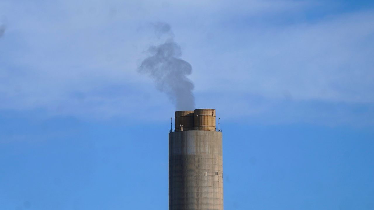 A smokestack stands at a coal plant on June 22, 2022, in Delta, Utah. (AP Photo/Rick Bowmer)