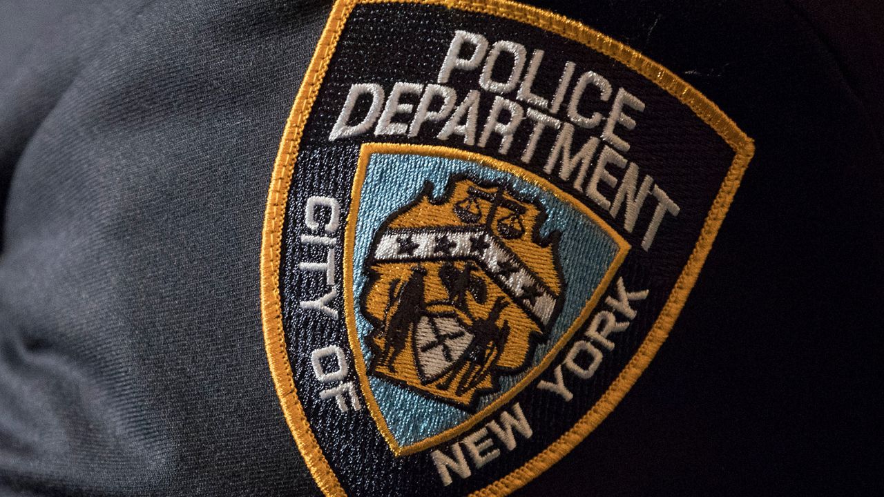 nypd police badge with black band