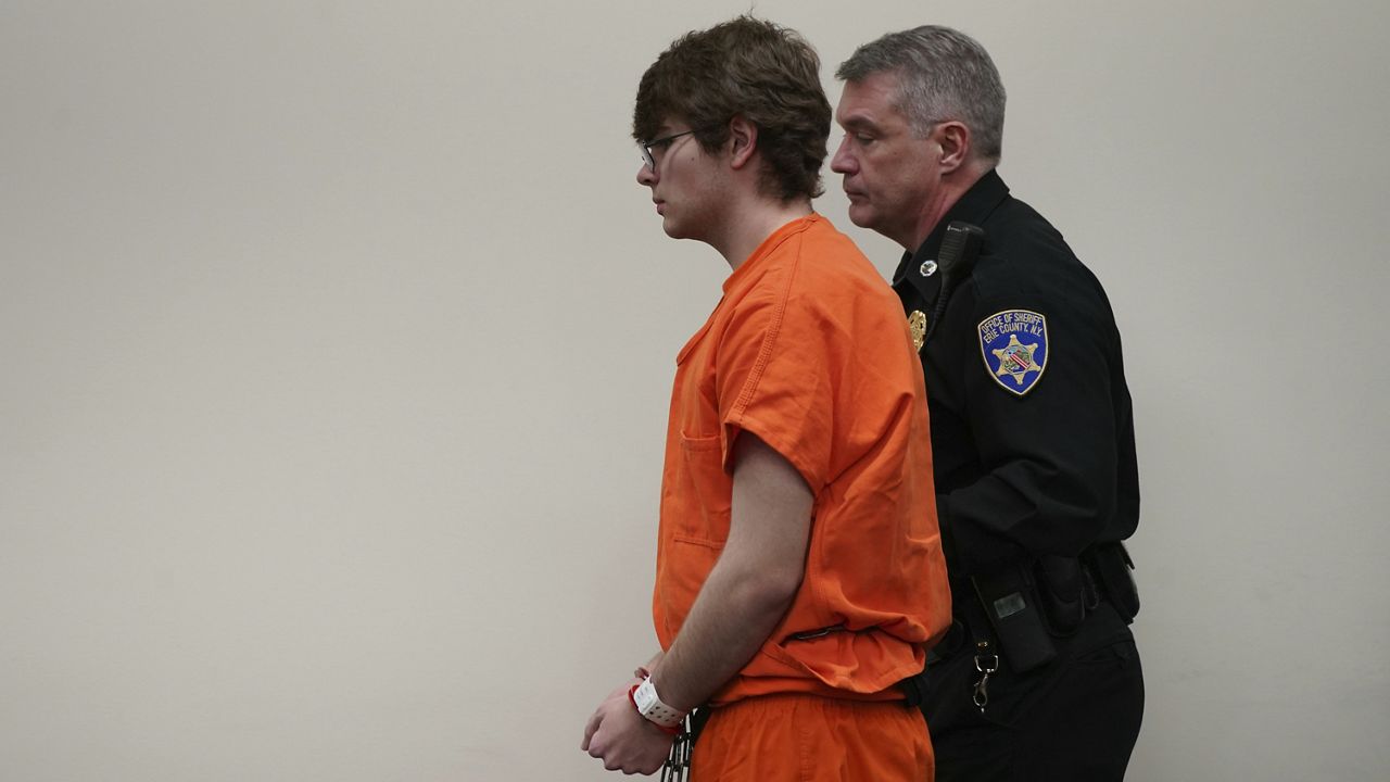 Payton Gendron is escorted out of the courtroom after he was sentenced to life in prison without parole by Erie County Court Judge Susan Eagan, Wednesday, Feb. 15, 2023 in Buffalo, N.Y. (Derek Gee/The Buffalo News via AP, Pool)