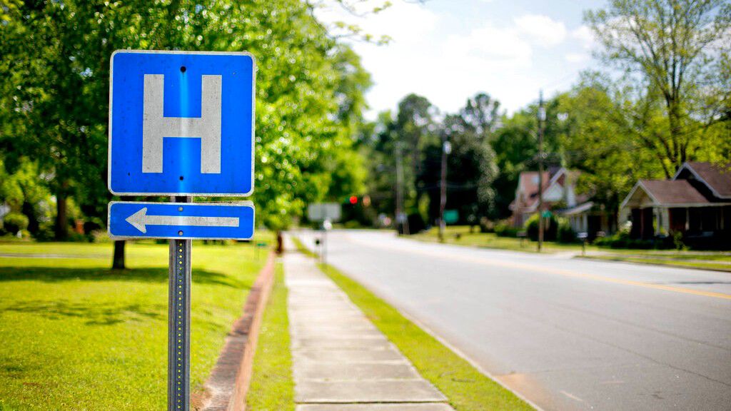 In this April 25, 2014 photo, a sign points the way to a hospital. (AP Photo/David Goldman)