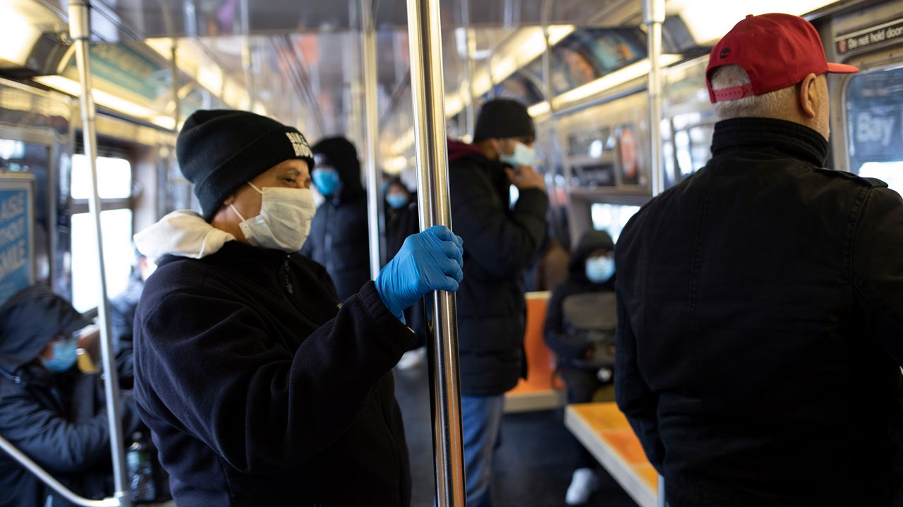 Subway bus passengers masks coronavirus MTA