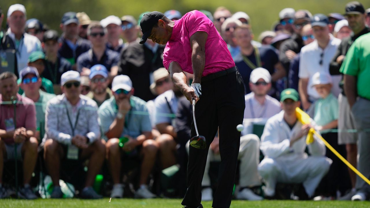 Tiger Woods hits his tee shot on the eighth hole during the first round at the Masters golf tournament on Thursday, April 7, 2022, in Augusta, Ga. (AP Photo/Matt Slocum)