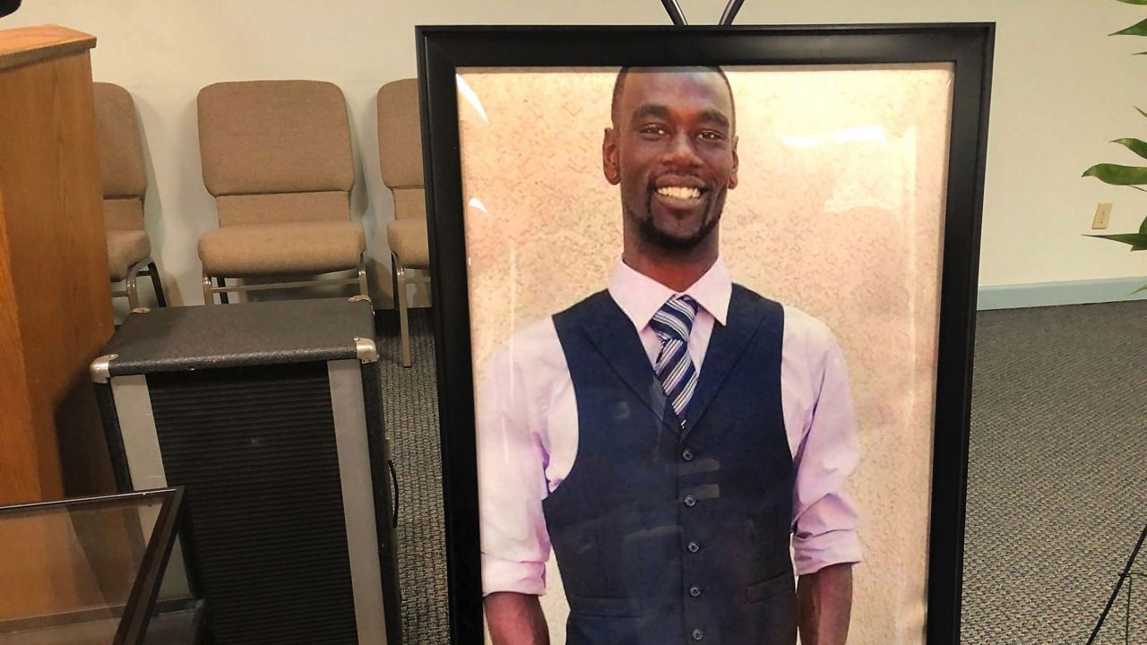 A portrait of Tyre Nichols is displayed at a memorial service for him on Tuesday, Jan. 17, 2023 in Memphis, Tenn. Nichols was killed during a traffic stop with Memphis Police on Jan. 7. (AP Photo/Adrian Sainz)