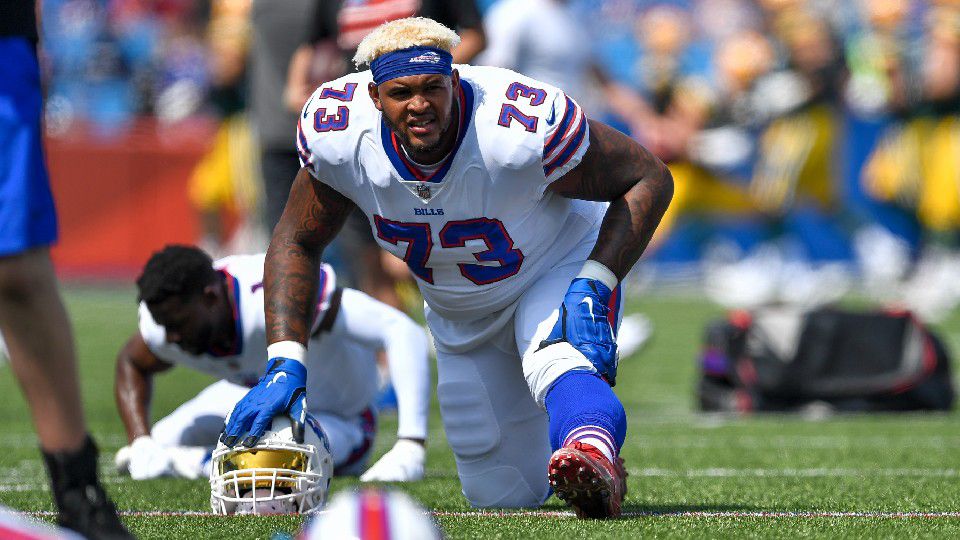 Buffalo Bills offensive tackle Dion Dawkins (73) takes the field