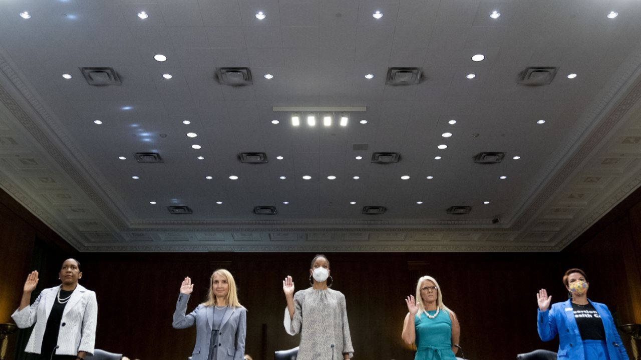 From left, Illinois Lt. Gov. Juliana Stratton, Senior Counsel and Director of the Center for Life for the Alliance Defending Freedom Denise Harle, UC Berkeley School of Law Professor Khiara Bridges, Alternatives Pregnancy Center Executive Director Heidi Matzke, and Planned Parenthood of the St. Louis Region and Southwest Missouri Chief Medical Officer Dr. Colleen McNicholas are sworn in to testify during a Senate Judiciary Committee Hearing to examine a post-Roe America, focusing on the legal consequences of the Dobbs decision, on Capitol Hill in Washington, Tuesday, July 12, 2022. (AP Photo/Andrew Harnik)