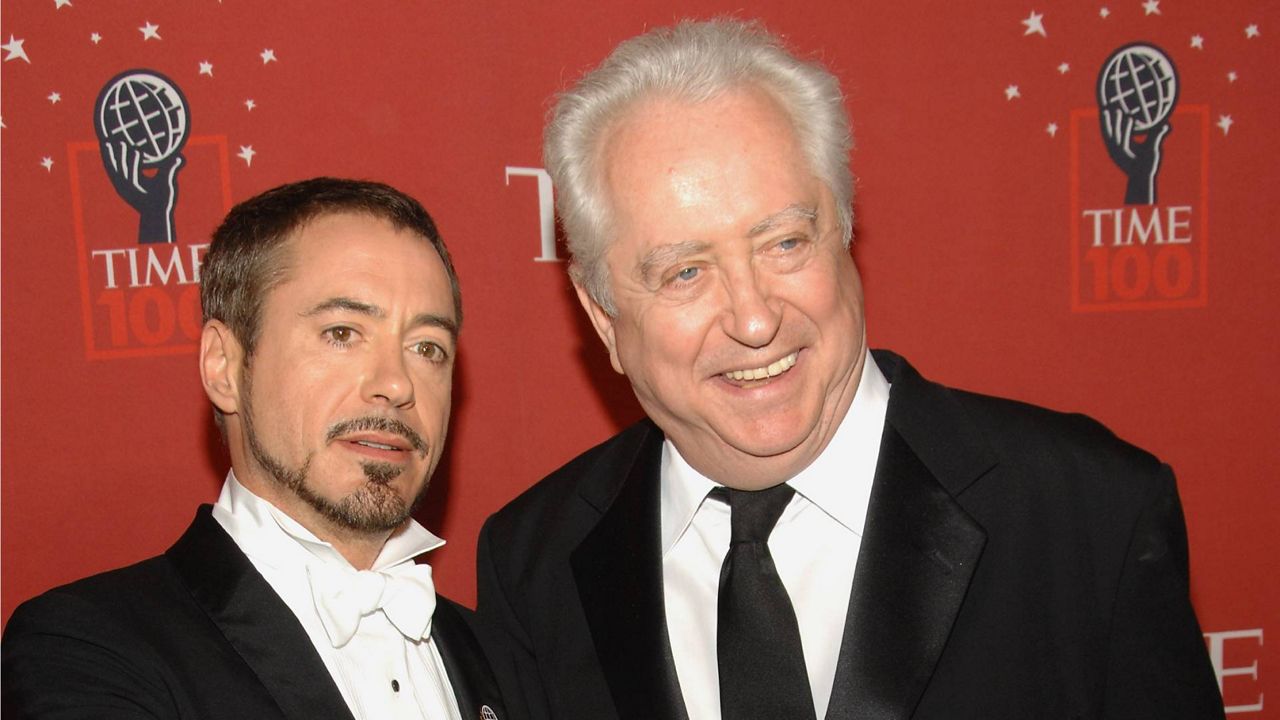 Actor Robert Downey Jr., left, and his father Robert Downey Sr. arrive at Time's 100 Most Influential People in the World Gala on May 8, 2008 in New York. (AP Photo/Evan Agostini)