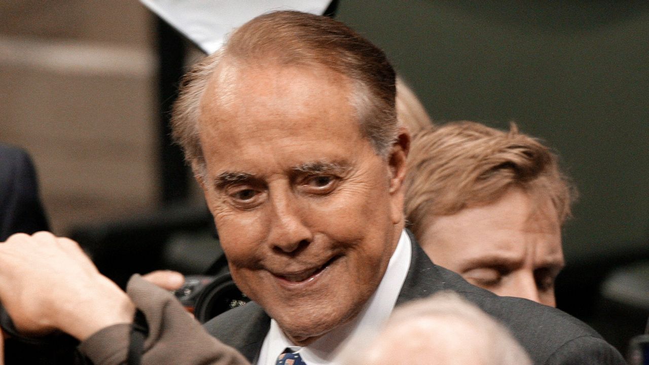 Former Sen. Bob Dole, R-Kan., arrives at the Republican National Convention in St. Paul, Minn., Wednesday, Sept. 3, 2008. (AP Photo/Paul Sancya)