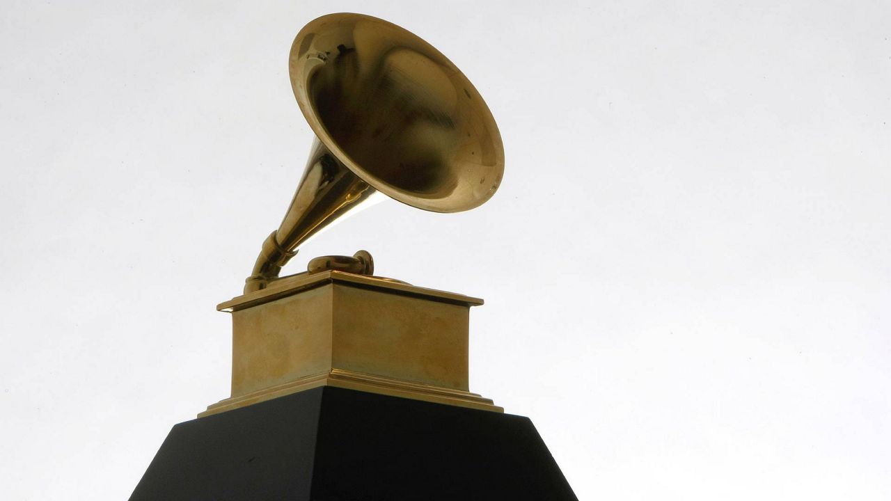 A Grammy Award statuette is photographed, Tuesday, Dec. 9, 2008 in Chicago. (AP Photo/Charles Rex Arbogast)