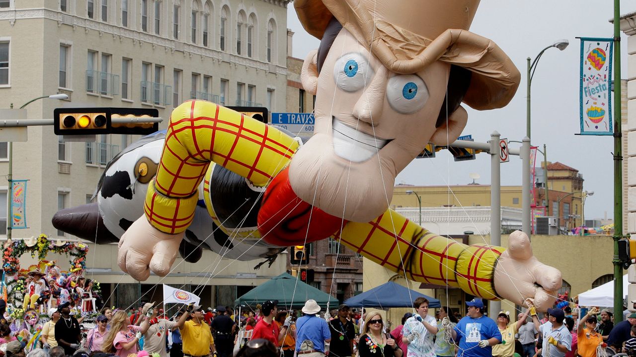 A "Woddy" balloon is pulled in this year's Fiesta San Antonio Battle of Flowers parade in San Antonio, Friday, April 24, 2009. (AP Photo/Eric Gay) 