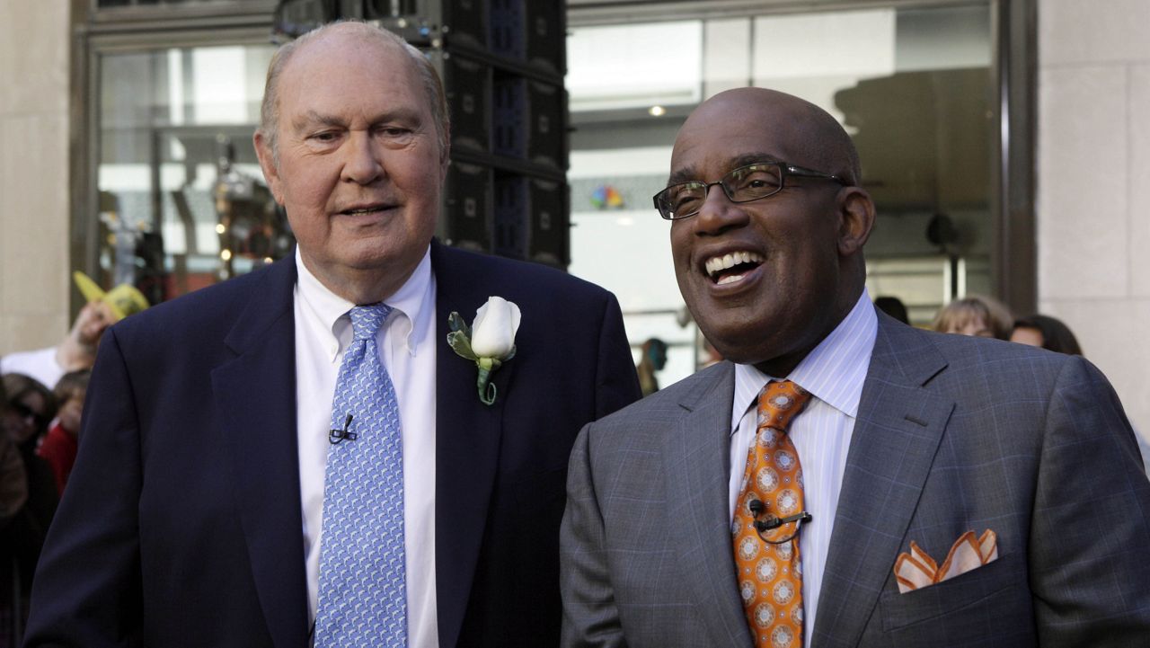 Willard Scott, left, and Al Roker, weathercasters on the NBC "Today" television program, appear on the show in New York Tuesday, July 14, 2009. (AP Photo/Richard Drew)