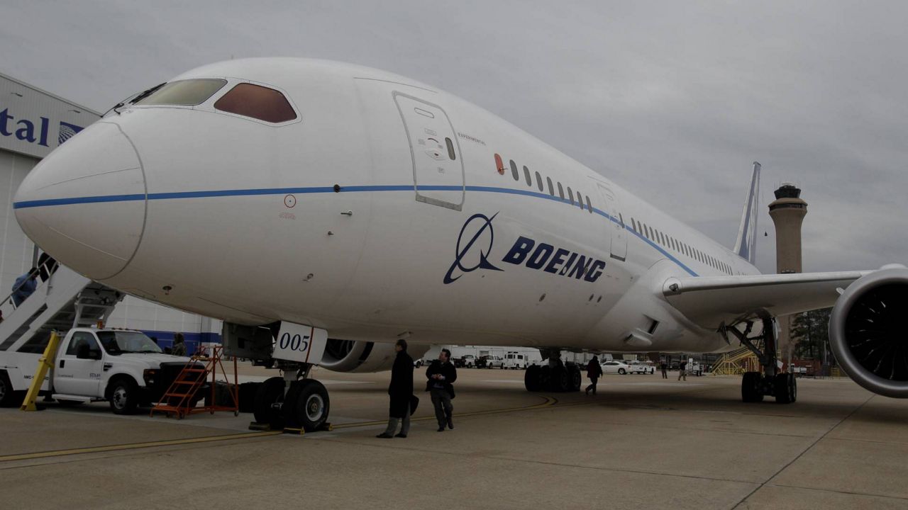 FILE - Boeings' new 787 Dreamliner sits on a tarmac at a Continental Airlines hangar Thursday, Feb. 3, 2011, in Houston. (AP/Pat Sullivan)