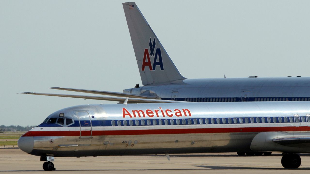 In this June 29, 2011 file photo, an American Airlines aircraft at Dallas-Fort Worth International Airport. (AP Photo/Tony Gutierrez, File)