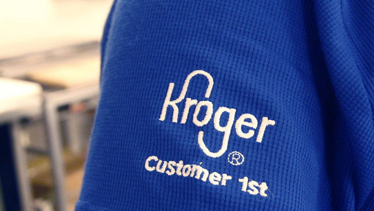 In this Nov. 28, 2011 photo, a deli worker wears the Kroger logo on her shirt sleeve, at the grocery store in Richardson, Texas. (AP Photo/LM Otero)
