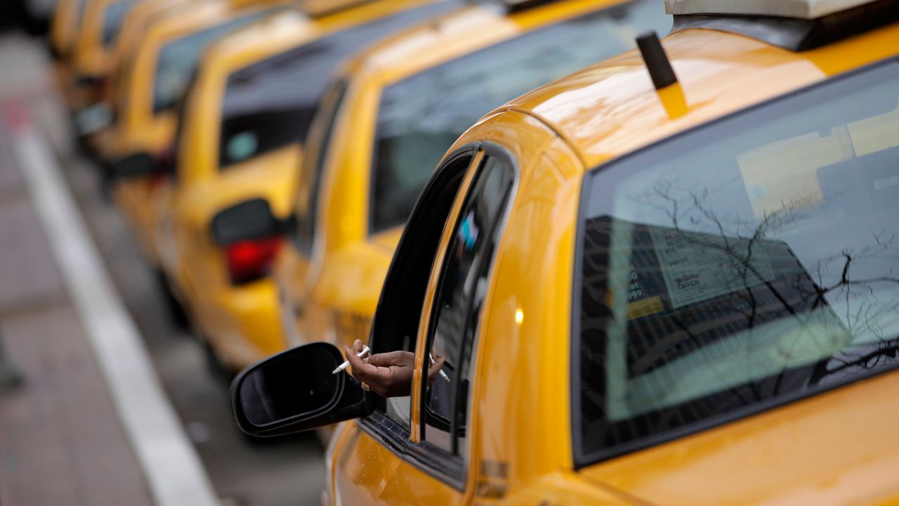 LADOT plans to overhaul the city’s taxi system with Prop. 22, enabling passengers to summon a ride with an app and know the price of their rides before getting into the car. (AP Photo/Jae C. Hong,File)